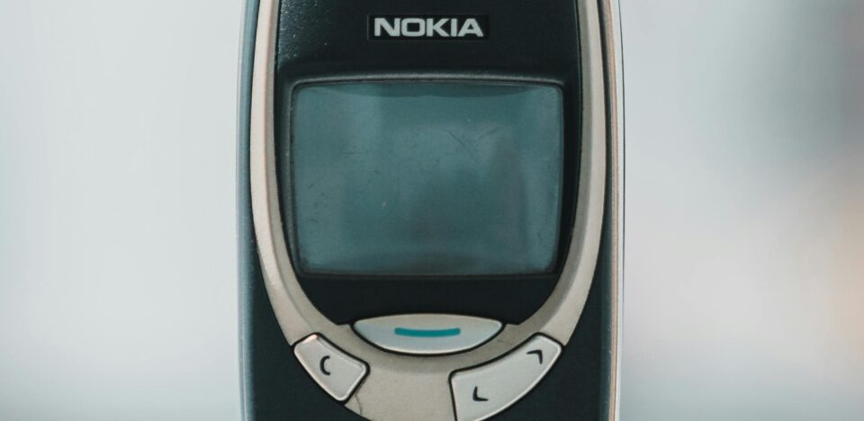 Retro Nokia 3310 cell phone shown in a classic front view, capturing its vintage charm.